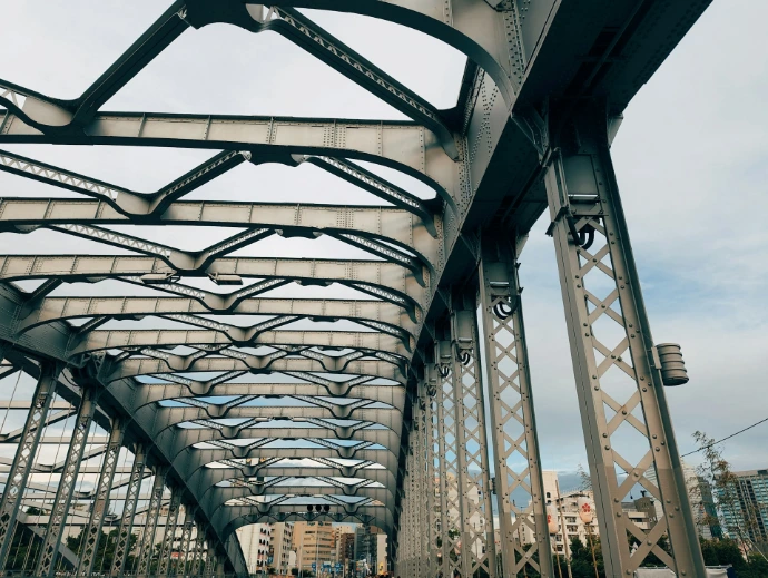 A view of a bridge from the ground